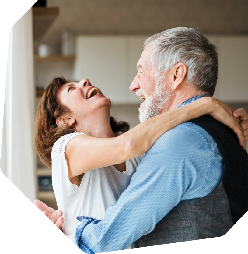 A man and a woman in a warm embrace